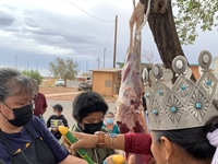 Miss Navajo Nation learning different ways of butchering from the community